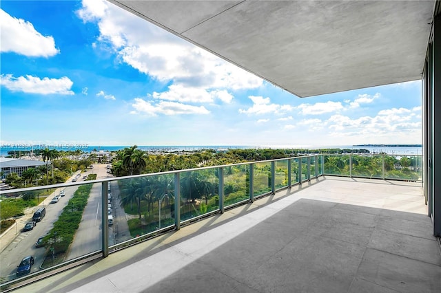 balcony featuring a water view