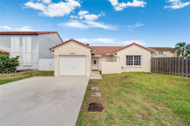 view of front of home with a garage and a front lawn