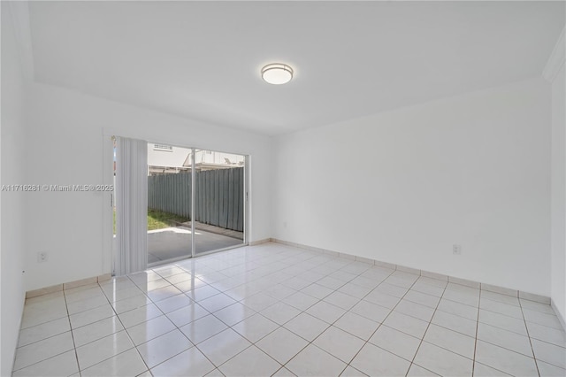 empty room featuring light tile patterned flooring