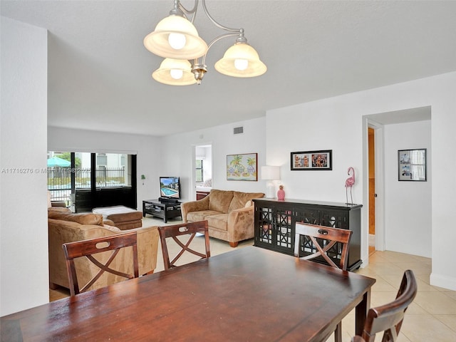 dining room with tile patterned flooring and visible vents