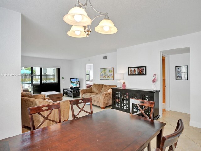 dining room featuring visible vents and tile patterned flooring