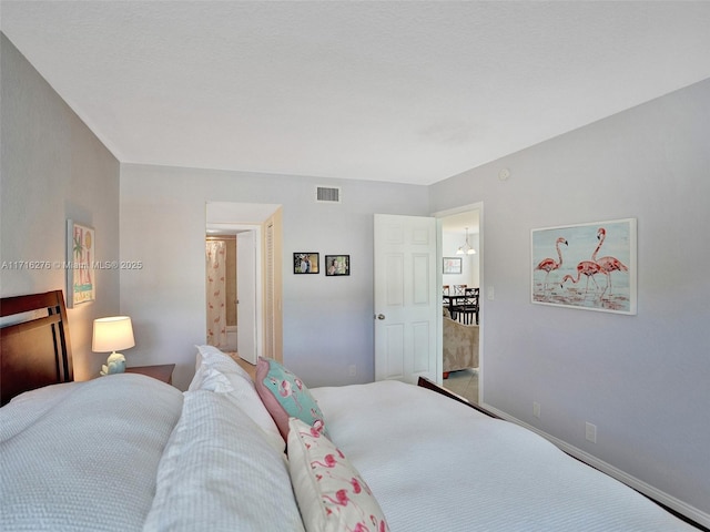 bedroom with visible vents