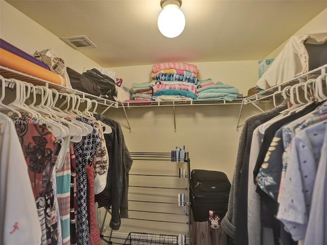 walk in closet featuring visible vents