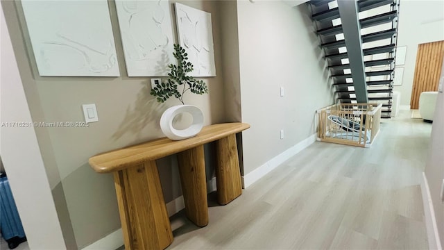 hallway featuring light hardwood / wood-style flooring