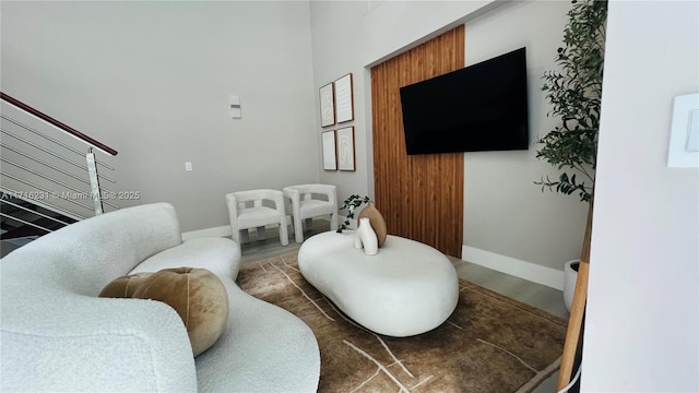 living room featuring dark wood-type flooring