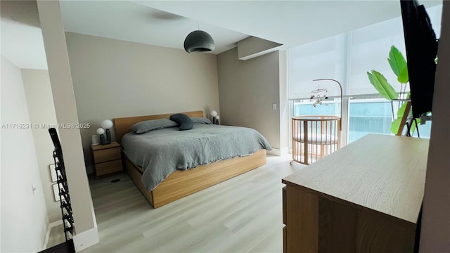 bedroom featuring light hardwood / wood-style flooring