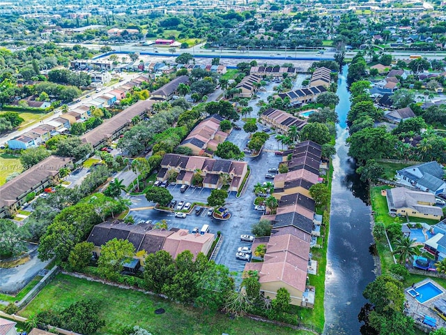 drone / aerial view with a water view