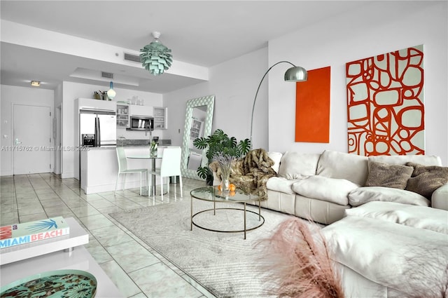 living room featuring light tile patterned floors