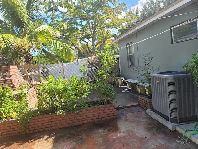 view of patio with central AC