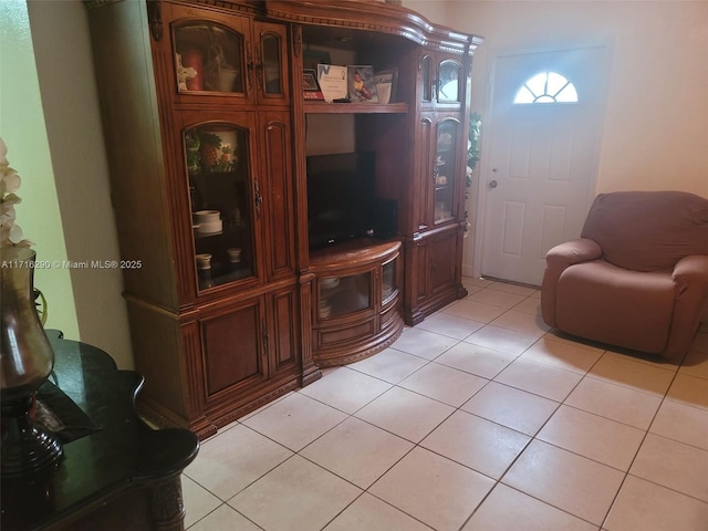 living room featuring light tile patterned flooring