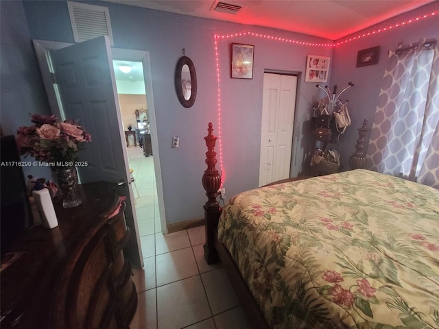 bedroom with light tile patterned flooring