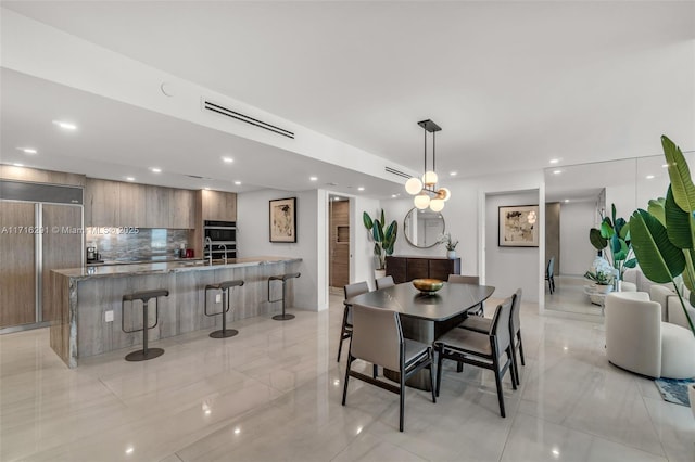 dining area featuring visible vents and recessed lighting