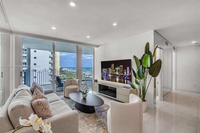 1500 Ocean Dr Unit 1003, Miami Beach, FL 33139 - living room featuring a glass covered fireplace, floor to ceiling windows, and recessed lighting