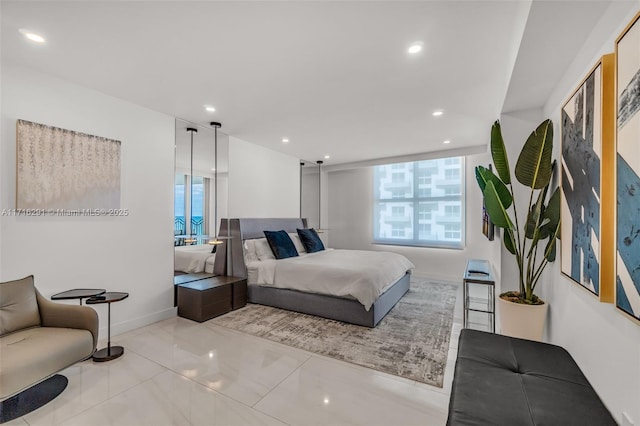 bedroom featuring baseboards and recessed lighting