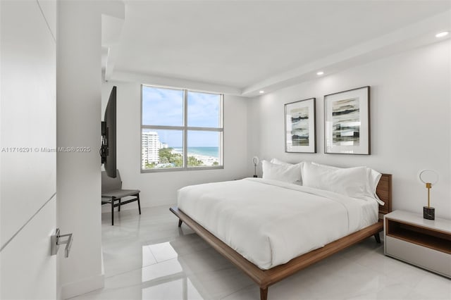 bedroom featuring light tile patterned flooring