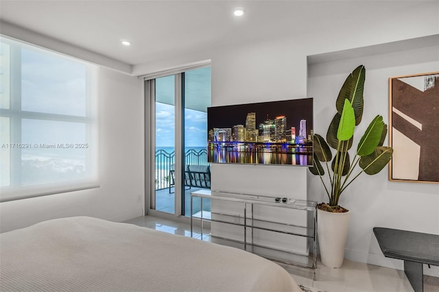 bedroom with access to outside, baseboards, and recessed lighting