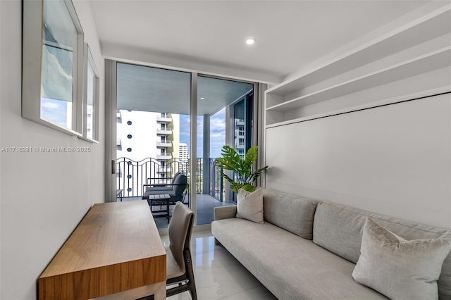 interior space featuring a wall of windows and recessed lighting