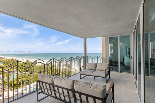 1500 Ocean Dr Unit 1003, Miami Beach, FL 33139 - balcony featuring an outdoor hangout area, a view of the beach, and a water view