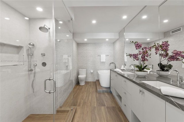 1500 Ocean Dr Unit 1003, Miami Beach, FL 33139 - bathroom featuring a stall shower, a sink, visible vents, and tile walls