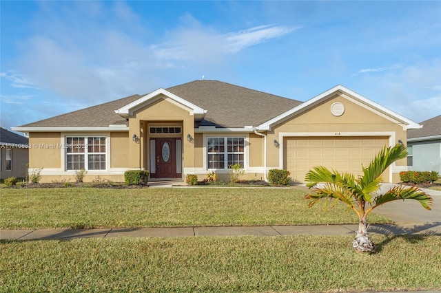 ranch-style home featuring a garage and a front yard