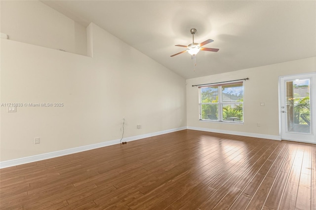 unfurnished room with dark hardwood / wood-style flooring, a wealth of natural light, and ceiling fan