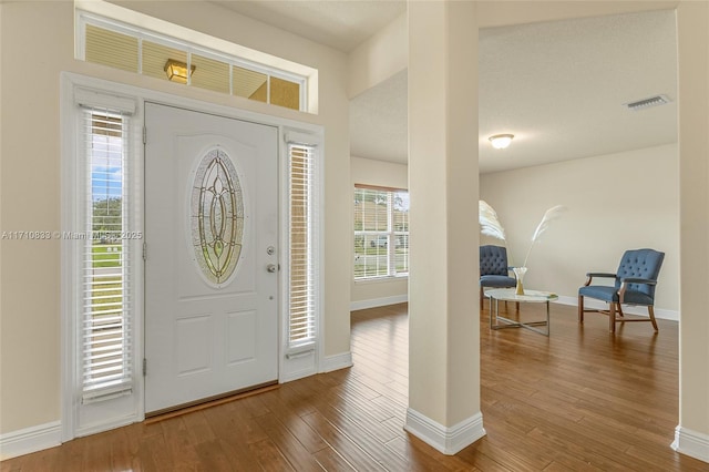 entryway featuring hardwood / wood-style flooring