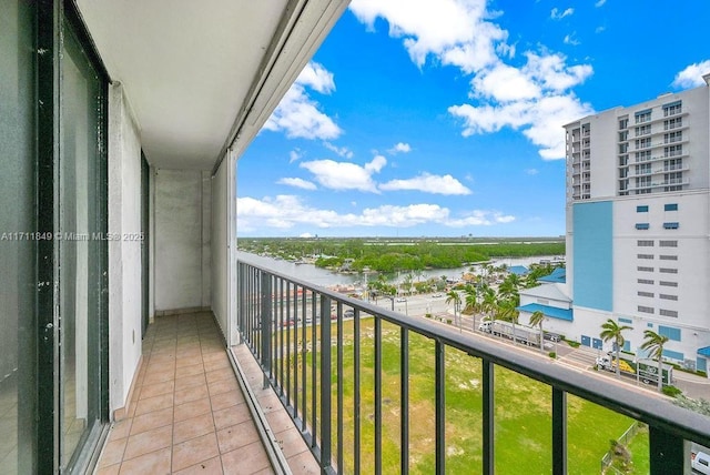 balcony featuring a water view