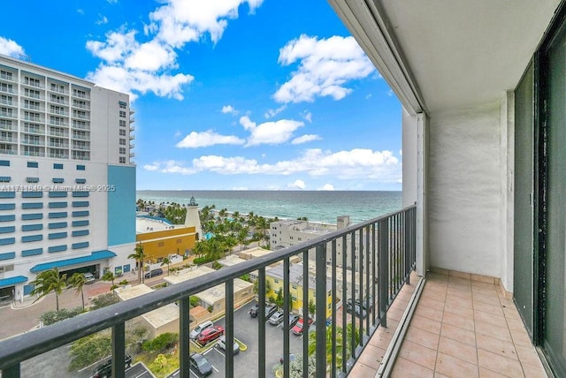 balcony featuring a water view