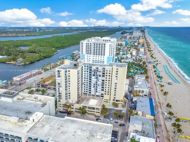 bird's eye view with a beach view and a water view