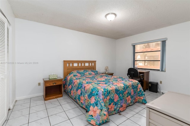 bedroom with a textured ceiling