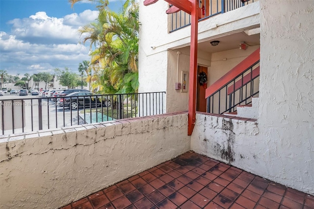 view of patio / terrace with a balcony