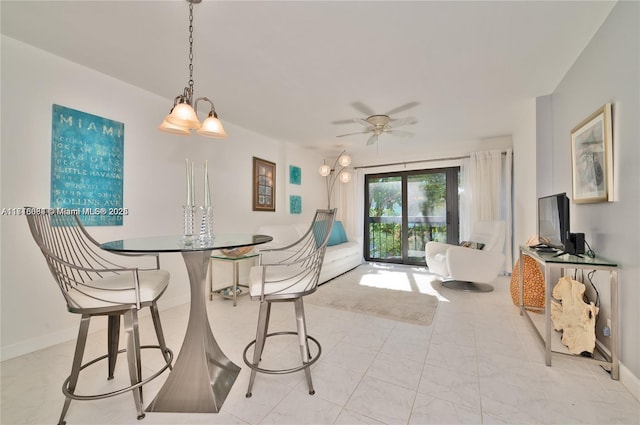 dining area featuring ceiling fan