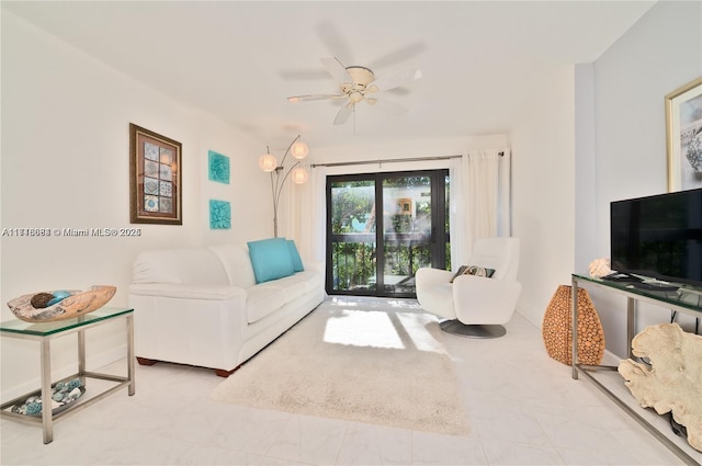 living room featuring ceiling fan