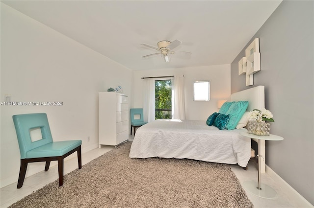 bedroom featuring ceiling fan