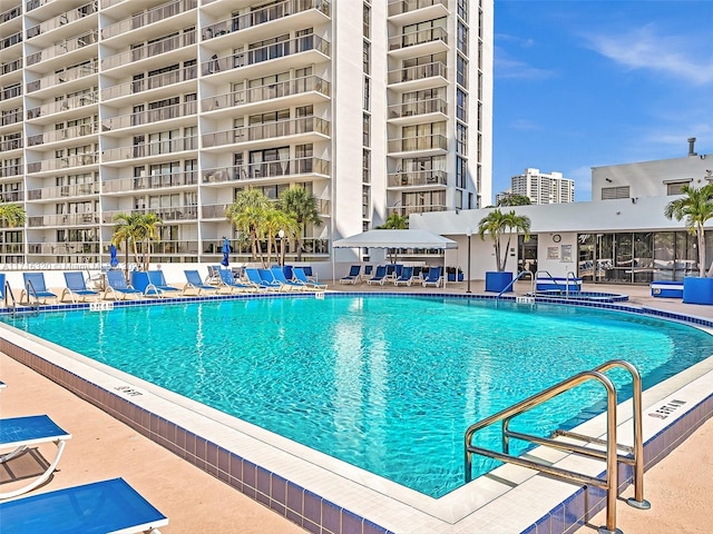 view of swimming pool with a patio area