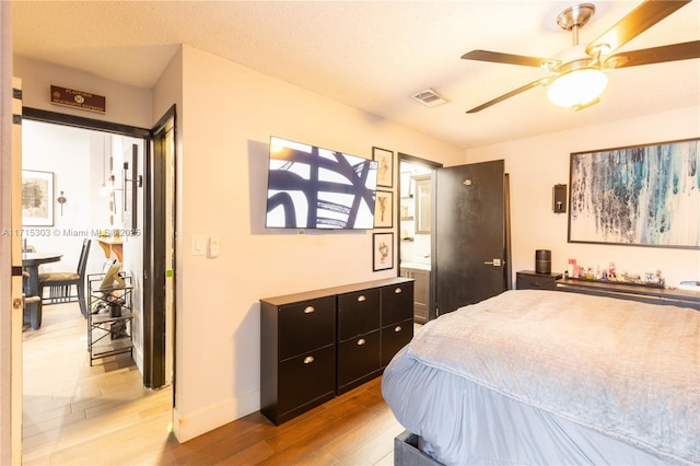 151 NW 115th Ave Unit 405, Plantation, FL 33325 - bedroom featuring light wood-type flooring and a ceiling fan