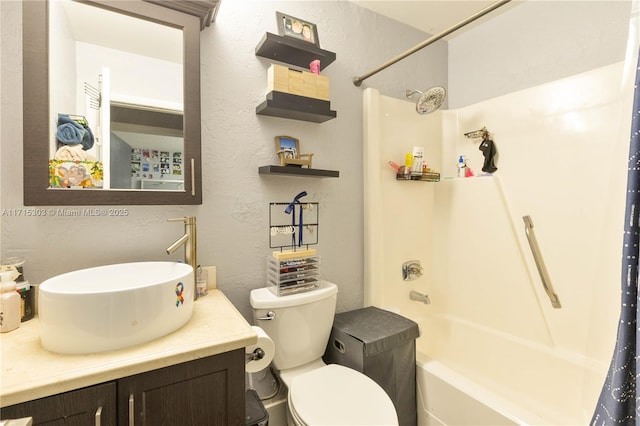 full bathroom featuring shower / bath combo, toilet, and vanity