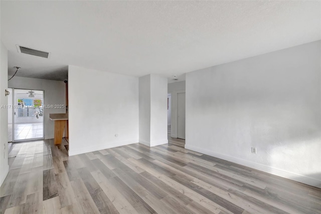 empty room featuring light hardwood / wood-style floors