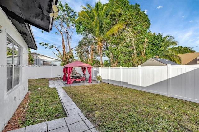 view of yard with a gazebo and a patio area