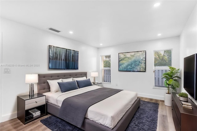 bedroom featuring light wood-type flooring