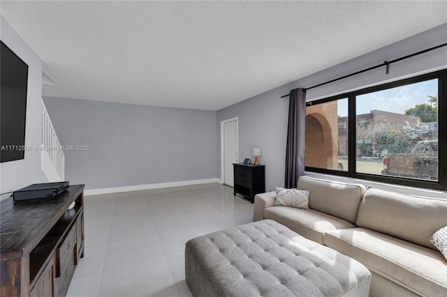 living room featuring a textured ceiling