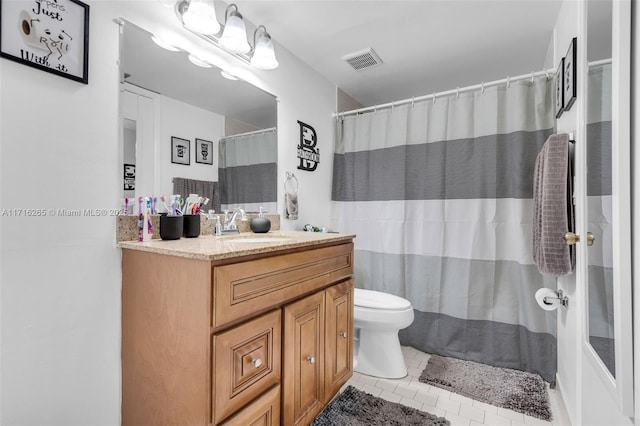 bathroom with tile patterned flooring, vanity, toilet, and a shower with curtain