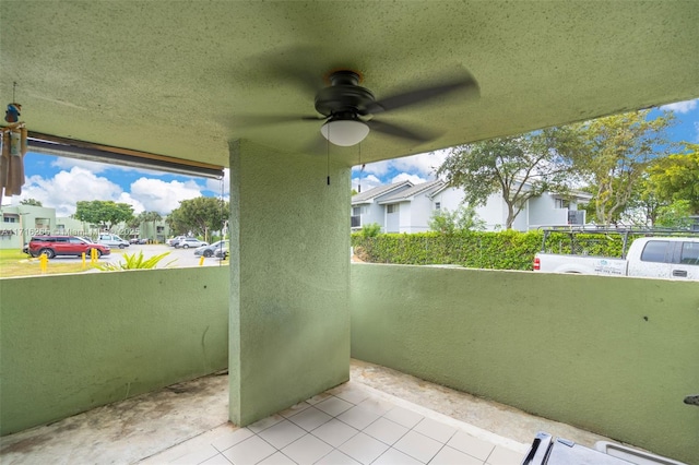 view of patio featuring ceiling fan