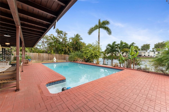 view of pool featuring a patio