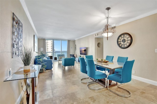 dining room featuring expansive windows and crown molding