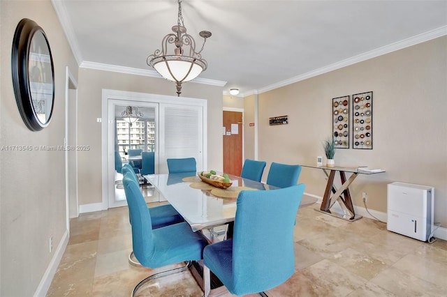 dining area featuring ornamental molding