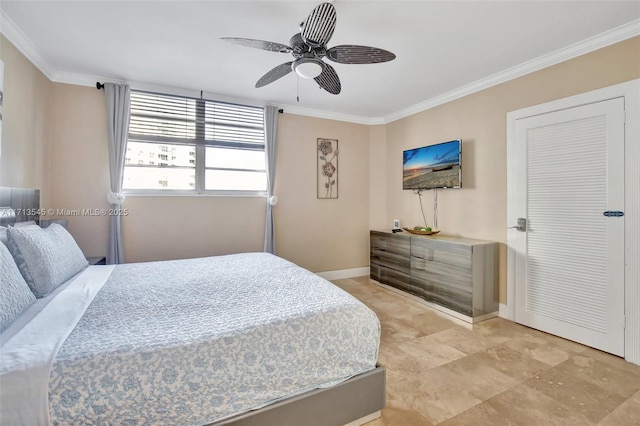 bedroom featuring ceiling fan and ornamental molding