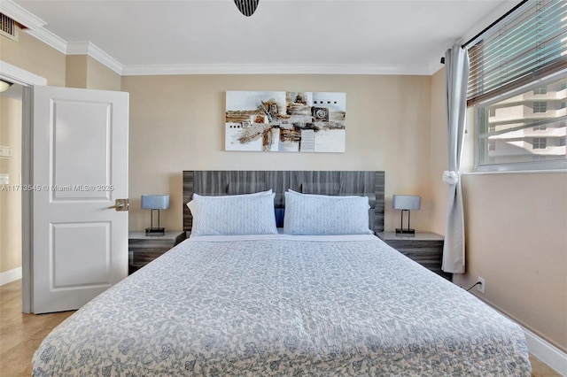 bedroom featuring ornamental molding