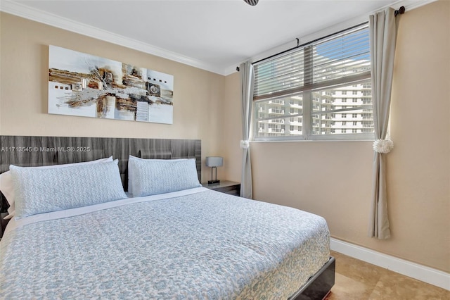 bedroom with crown molding