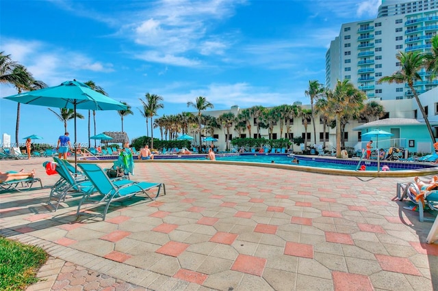 view of swimming pool featuring a patio area